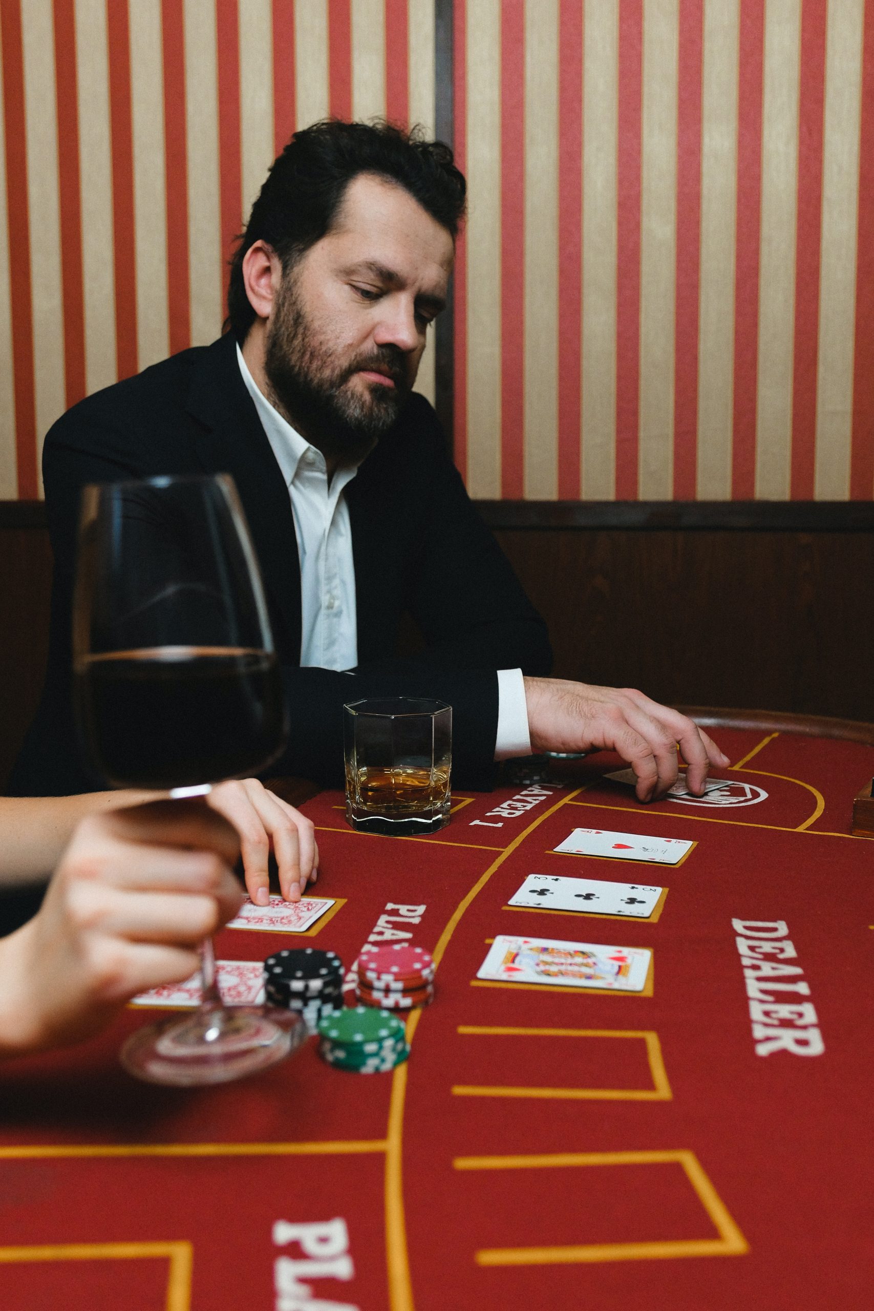 The Psychology Behind Blackjack: Playing the Dealer