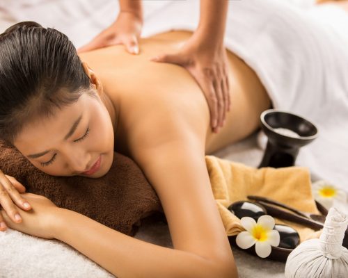Asian woman having massage and spa salon Beauty treatment concep