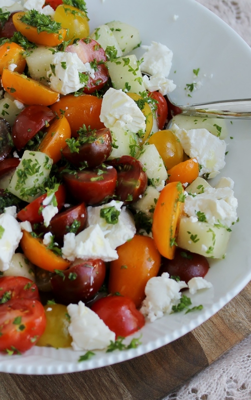 Tomatsalat med melon, feta og persille