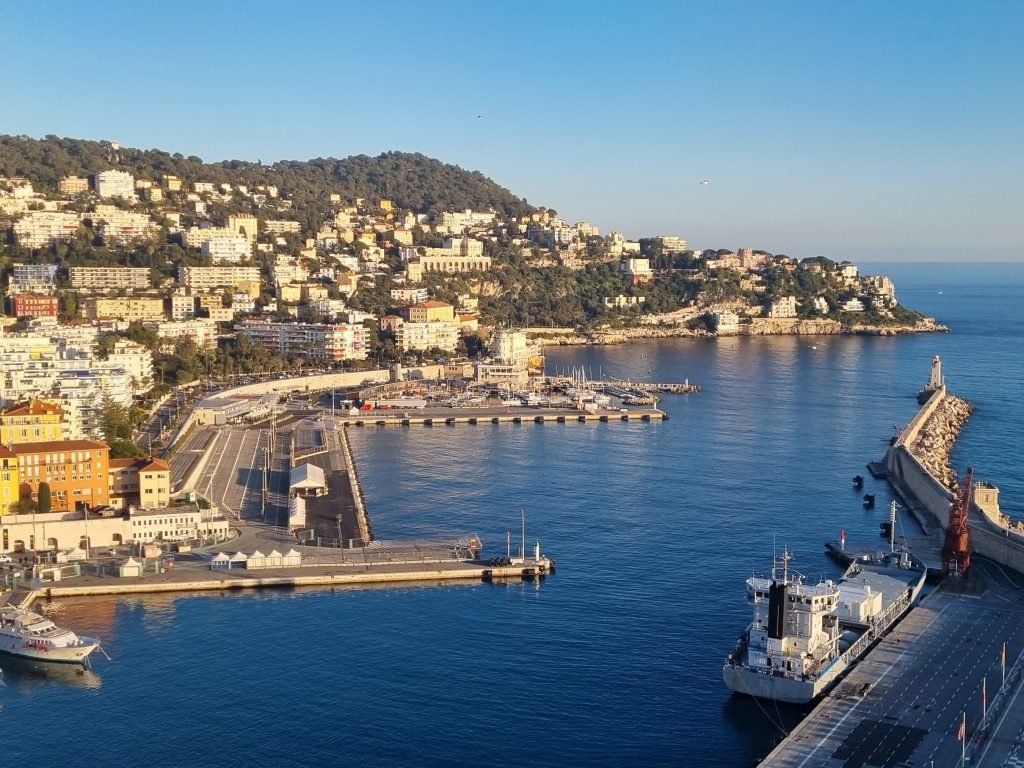 A view of the Port with hills and houses in the background