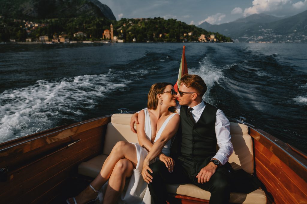 Happy in a Riva on Lake Como, Italy. By Christin Eide Photography