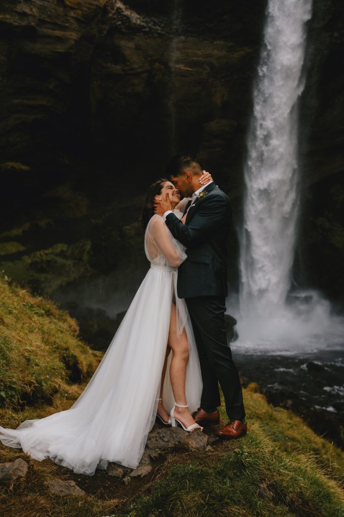 Waterfall kiss in Iceland. By Christin Eide Photography