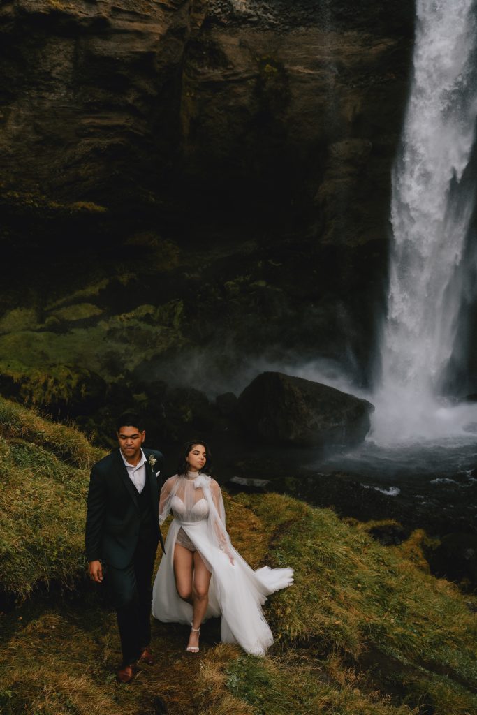 Walking away from waterfall canyon in Iceland. By Christin Eide Photography