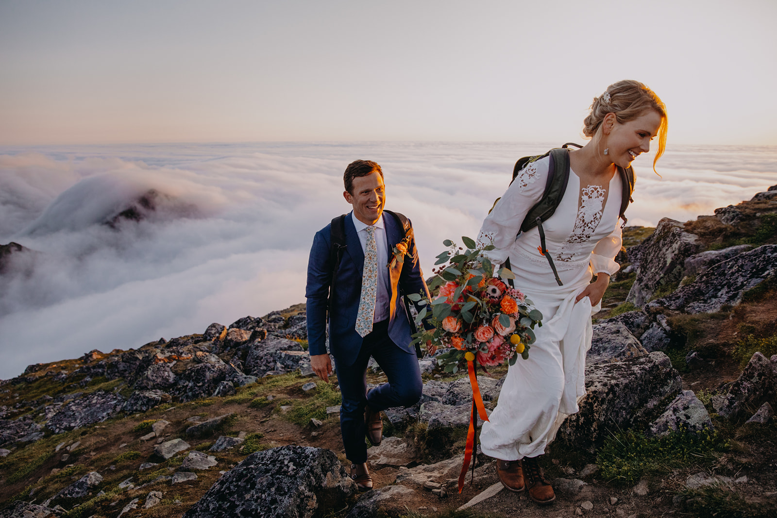 Hiking up a mountain in Lofoten, Norway. By Christin Eide Photography