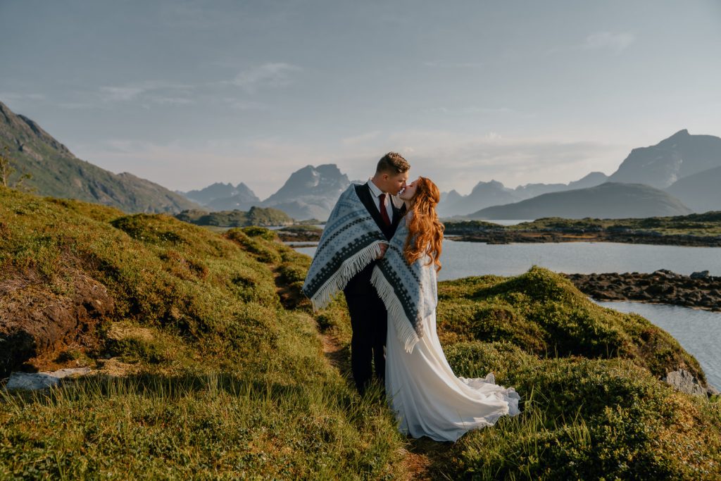 Stunning mountain top elopement in Lofoten, Norway, photographed by Christin Eide Photography
