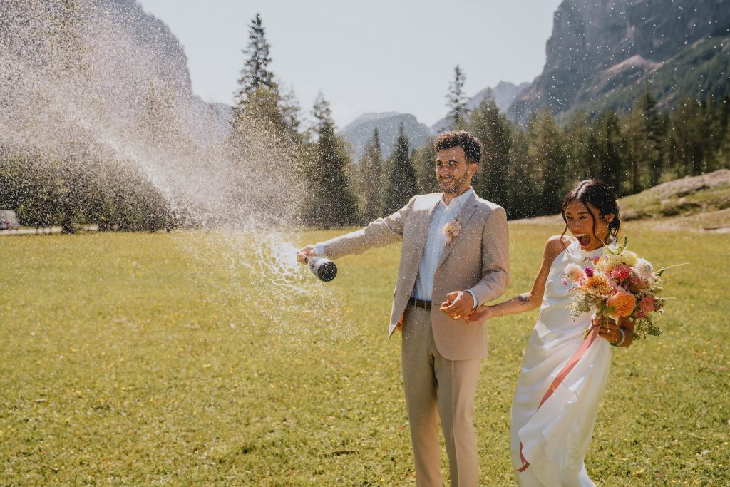 Christin Eide Photography - Intimate wedding champagne spray Dolomites, Italy
