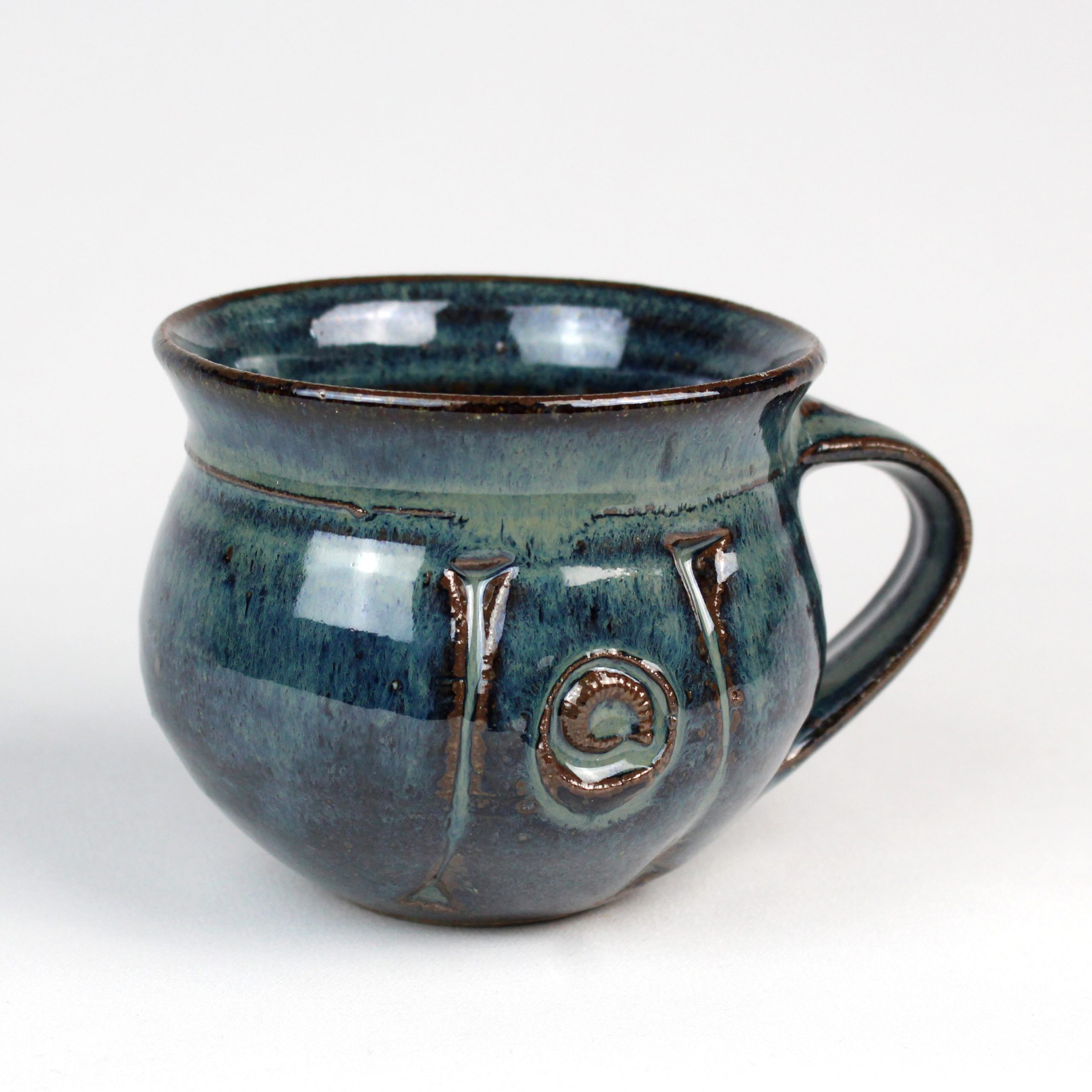 Dark Blue Teacup by Britta James