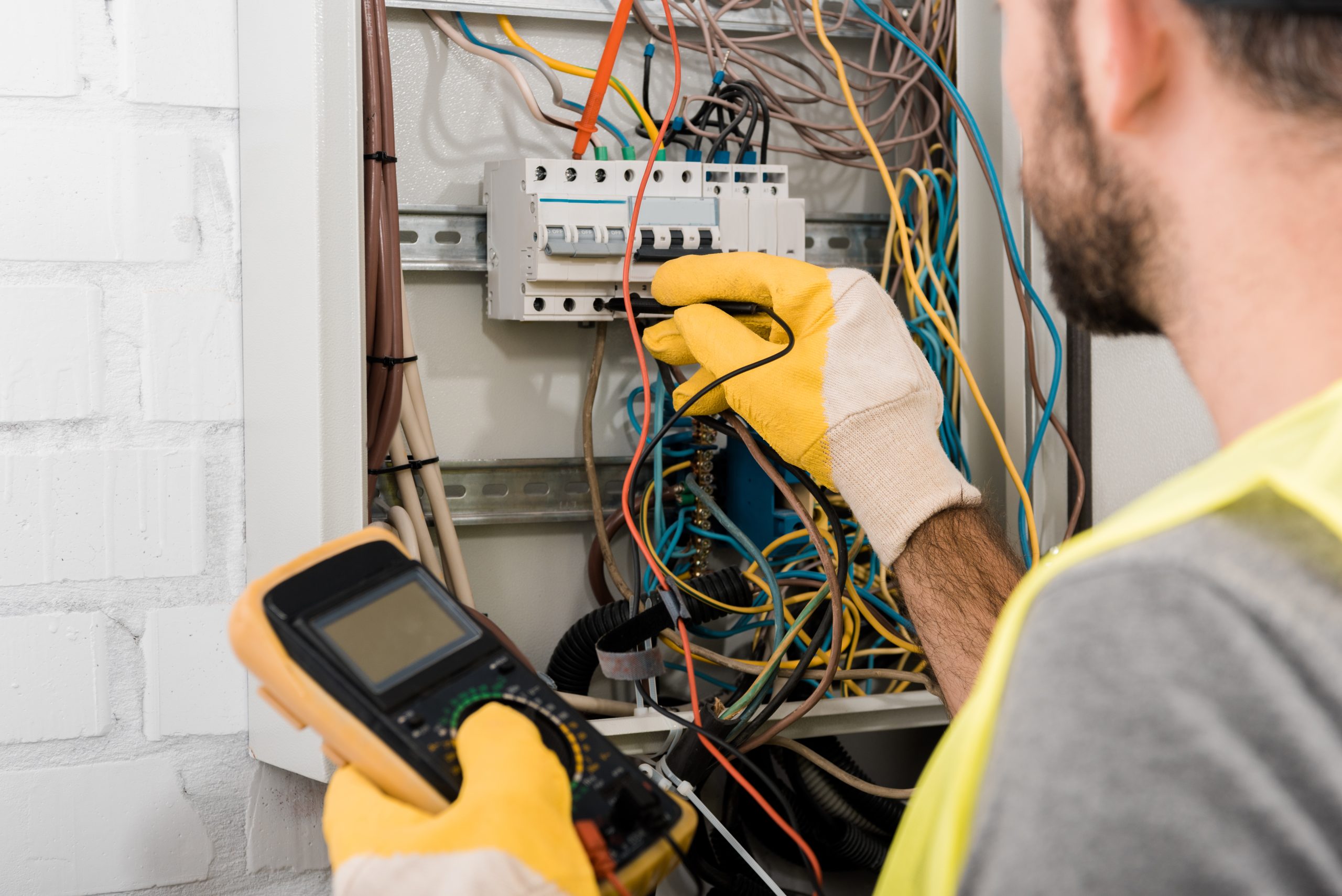 VistaCreate-217089698-stock-photo-cropped-image-electrician-checking-electrical