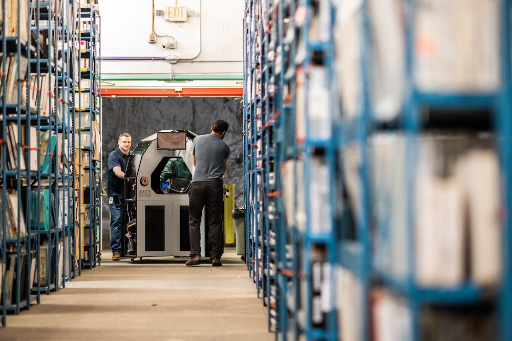 Iron Mountain archivists at work among the vaults in the company’s Boyers, Penn., facility. Photo: Courtesy of Iron Mountain.