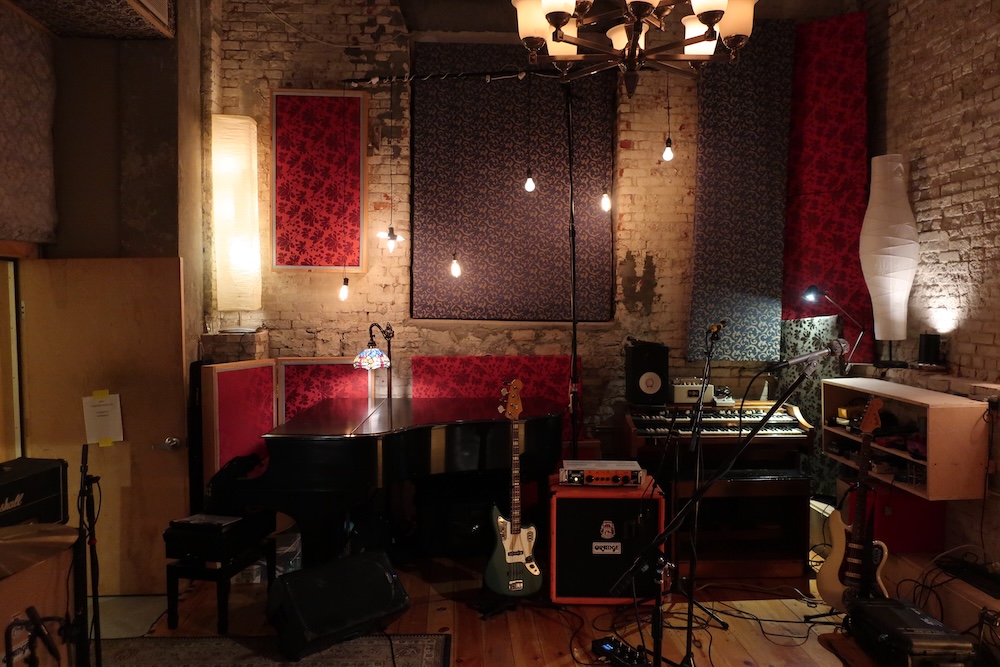 The live room at Vinegar Hill Sound, where the vintage vibe matches the analog sound. Note the 1923 Steinway Model L grand piano. Photo: Reed Black