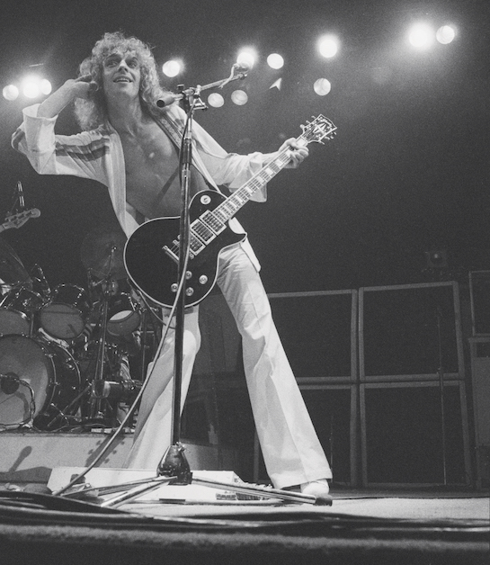 The tubing of Peter Frampton’s Bob Heil-built Talk Box effect is readily evident on his mic stand in this photo from the Frampton Comes Alive! era. PHOTO: Michael Putland/Getty Images.