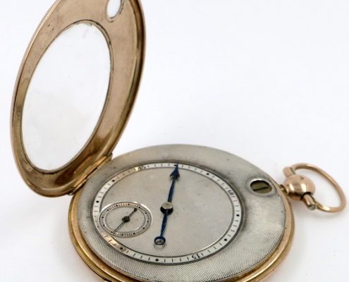 Gold, jump hour cylinder pocket watch