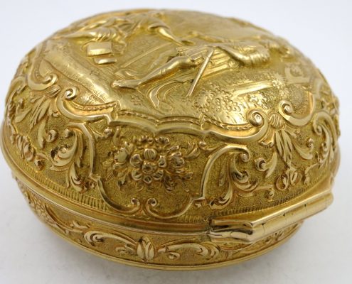 Gold repousse pair cases