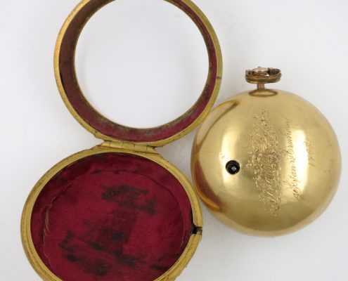 Gold repousse pair cases