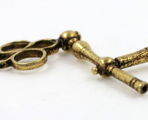 Gold crank key