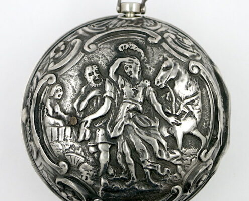 Silver repousse pair cases