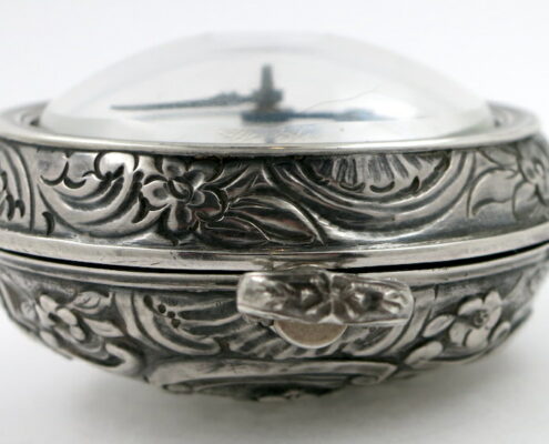 Silver repousse pair cases