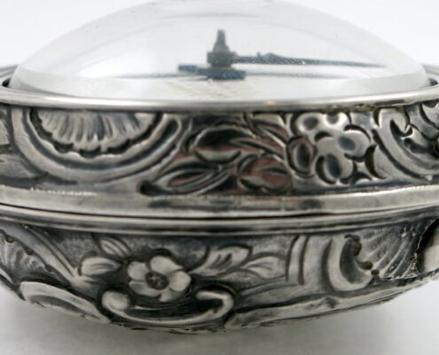 Silver repousse pair cases