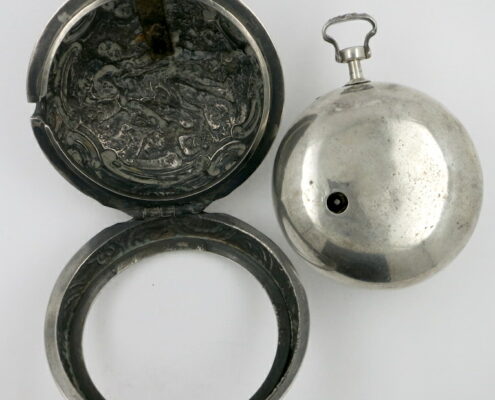 Silver repousse pair cases