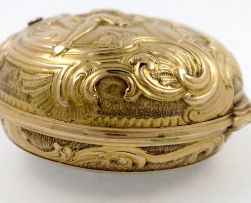 Gold repousse pair cases