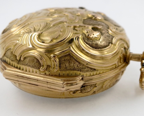 Gold repousse pair cases