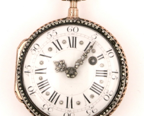 gold skeletonised pocket watch