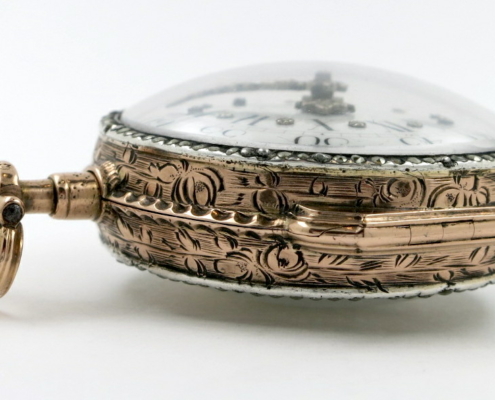 gold skeletonised pocket watch