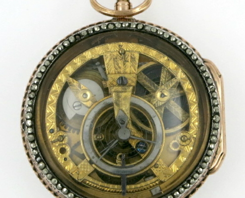 gold skeletonised pocket watch