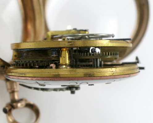 gold skeletonised pocket watch