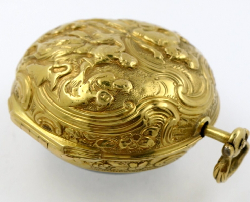 Gold repousse watch