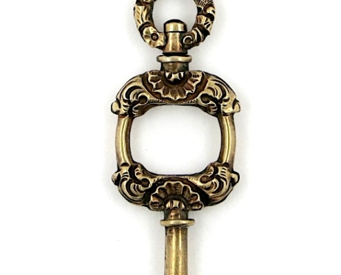 Gold pocket watch key