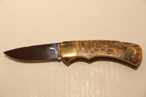 S.715 CK Micarta inciso