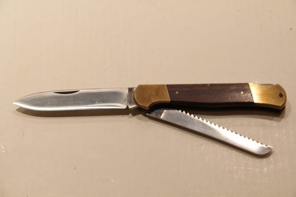 Coltello TASCA - Manico Legno Due Testine Ottone