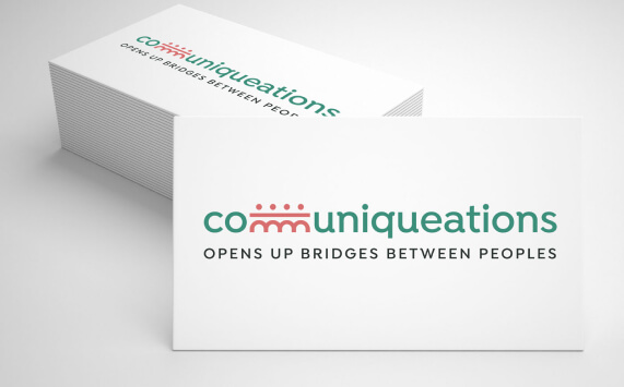 Business cards with Communiqueations logo