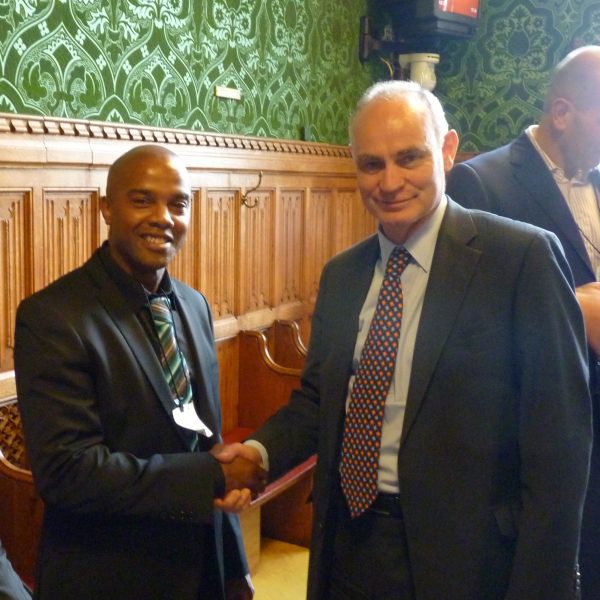 'Michael with Crispin Blunt the parliamentary secretary of state for prisons and youth justice at the House Of Lords 2012, 'Safe Ground's' symposium day, where Michael was guest speaker alongside Digby Griffith, Director  (NOMS). subject matter desistance from crime.