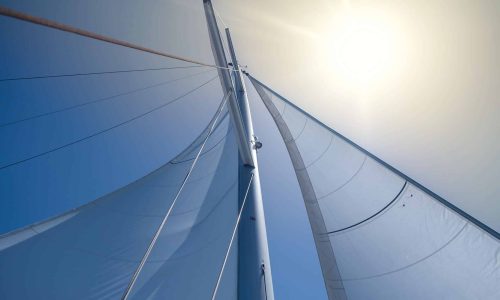 yacht-sails-on-clear-blue-sky-background-sailing-2023-11-27-05-27-08-utc-edit