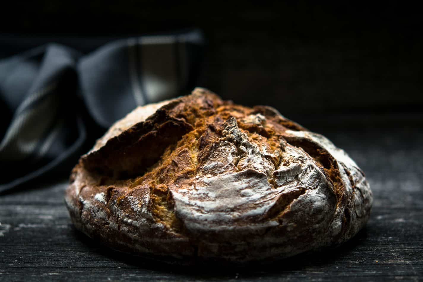 Sourdough bread on black background