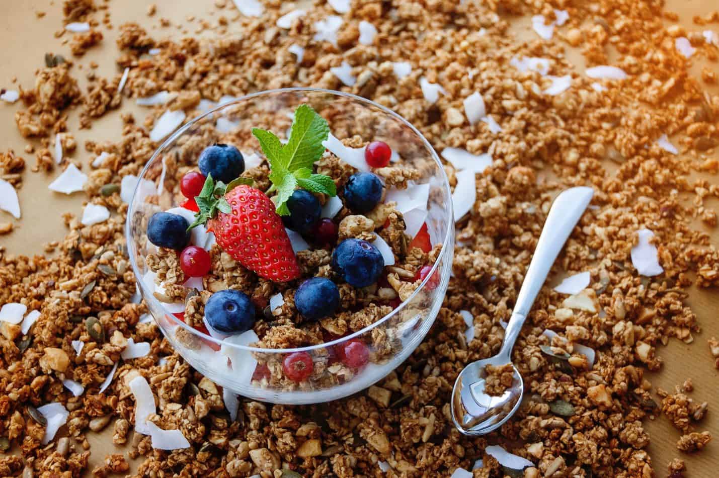 Granola with blueberries, strawberries and mint