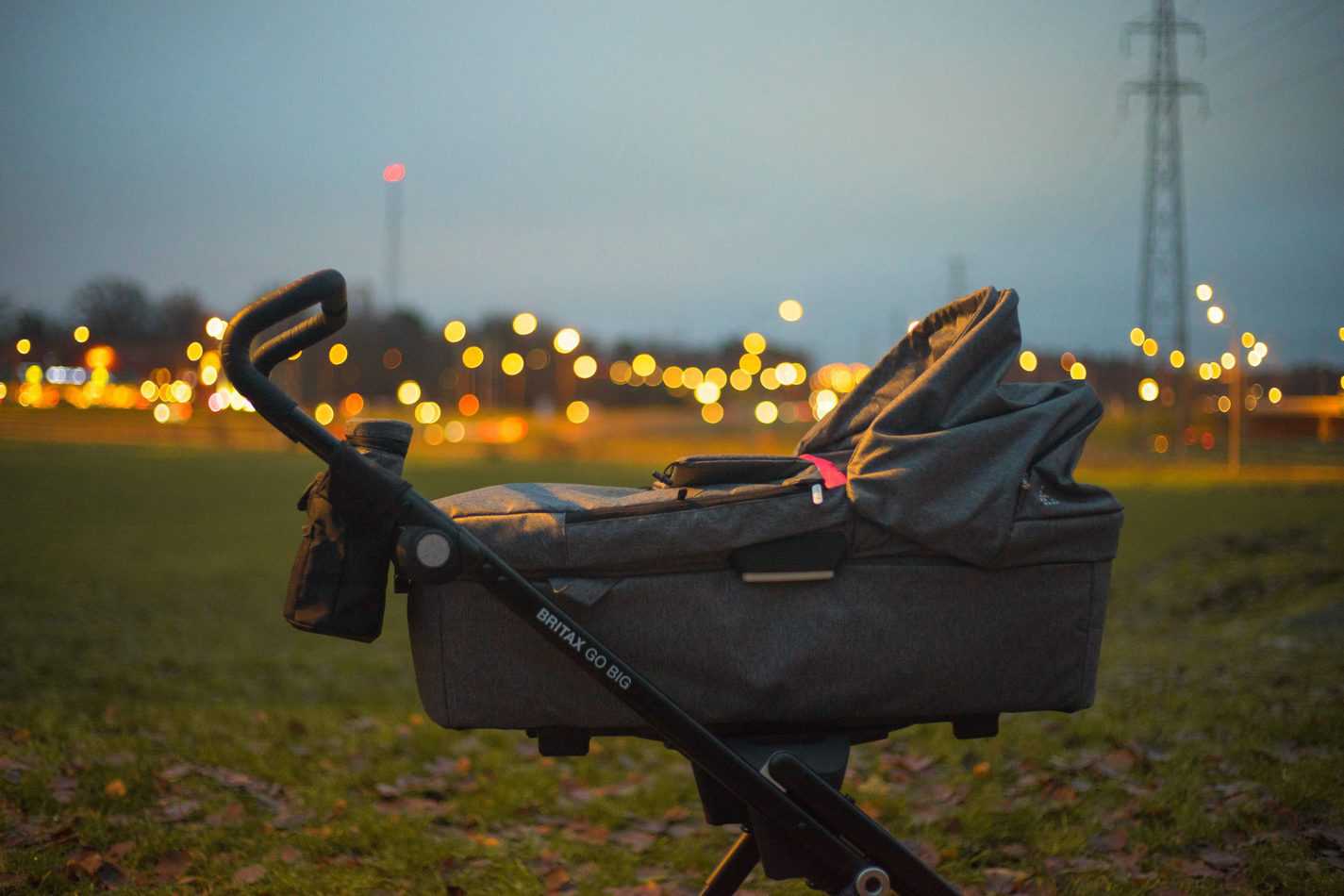 Stroller on grass field