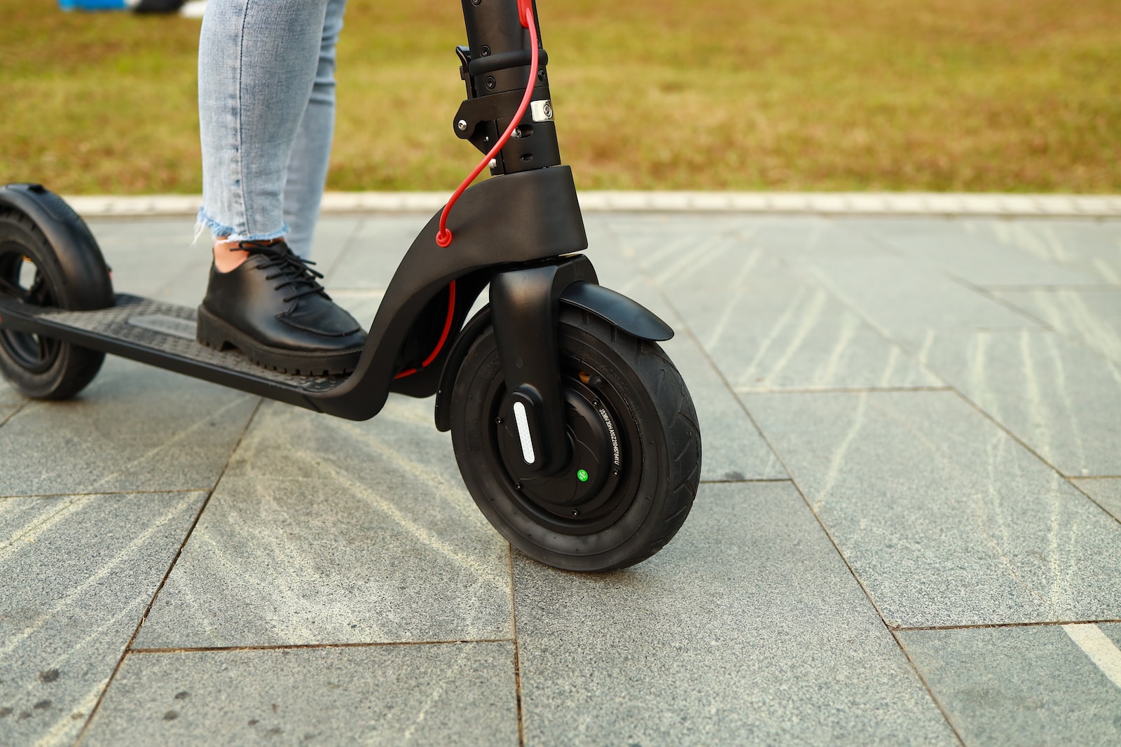 a person riding a scooter