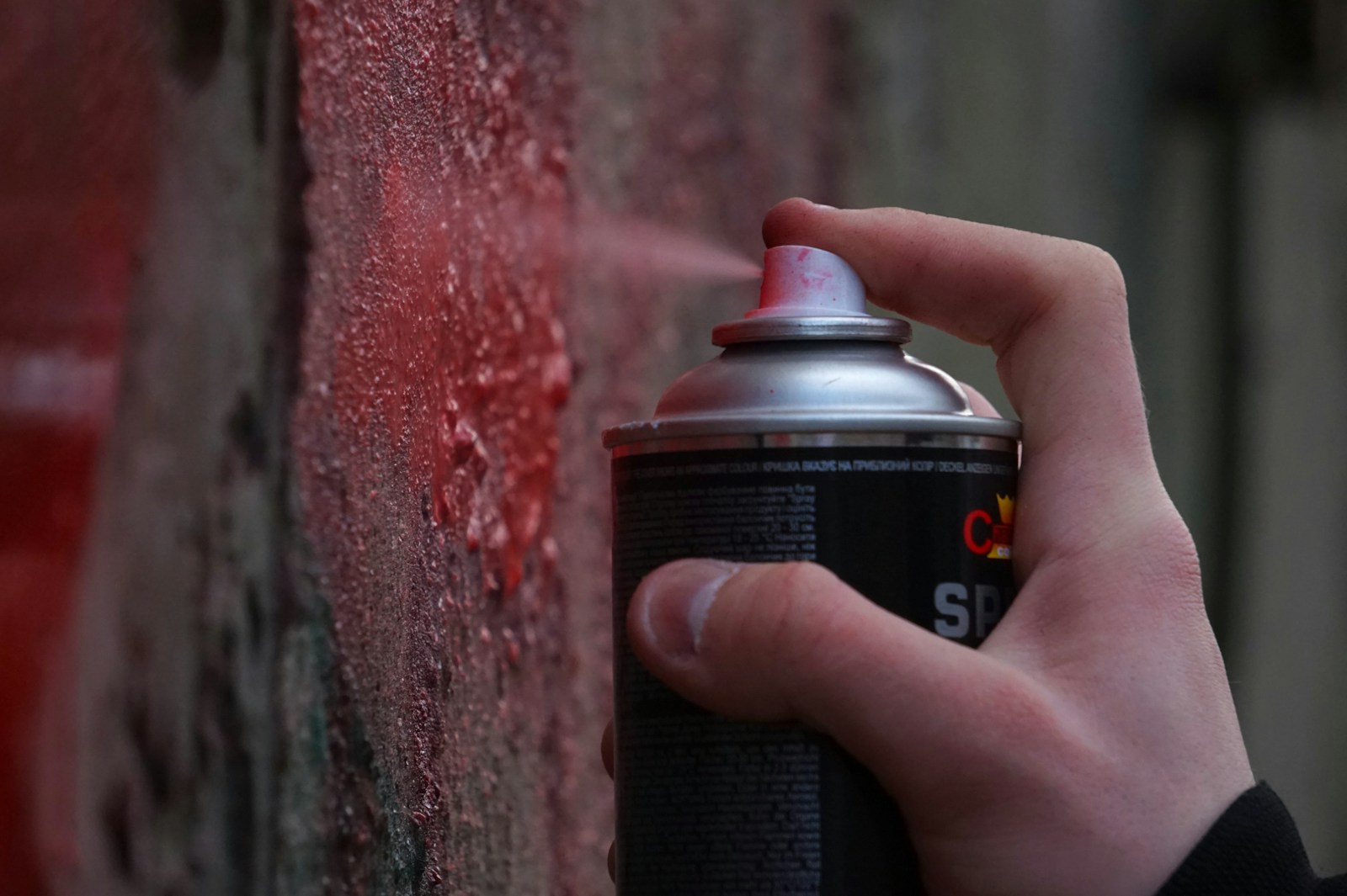 black and red spray bottle