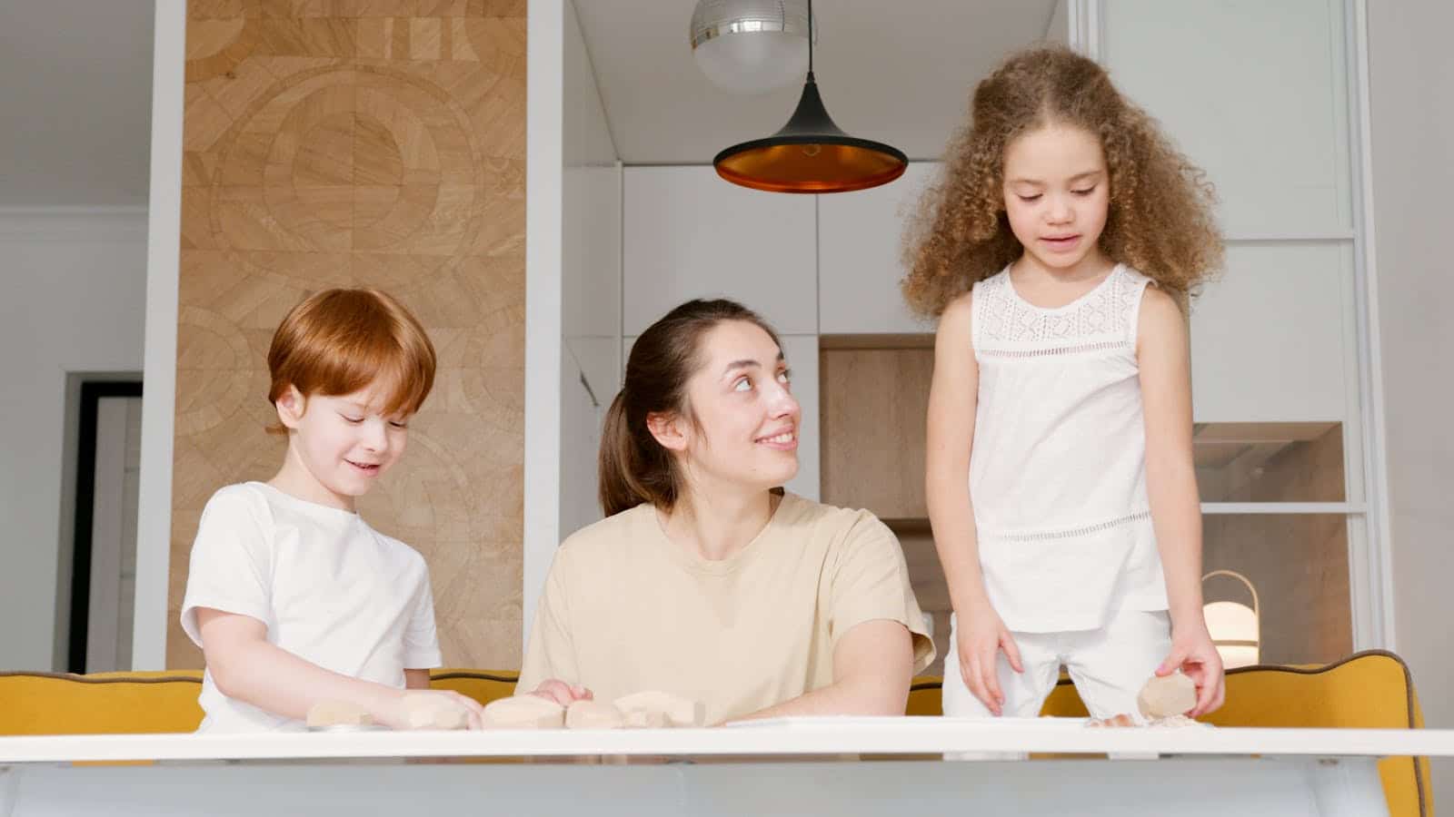 A cheerful family enjoying quality time at home, playing together indoors.