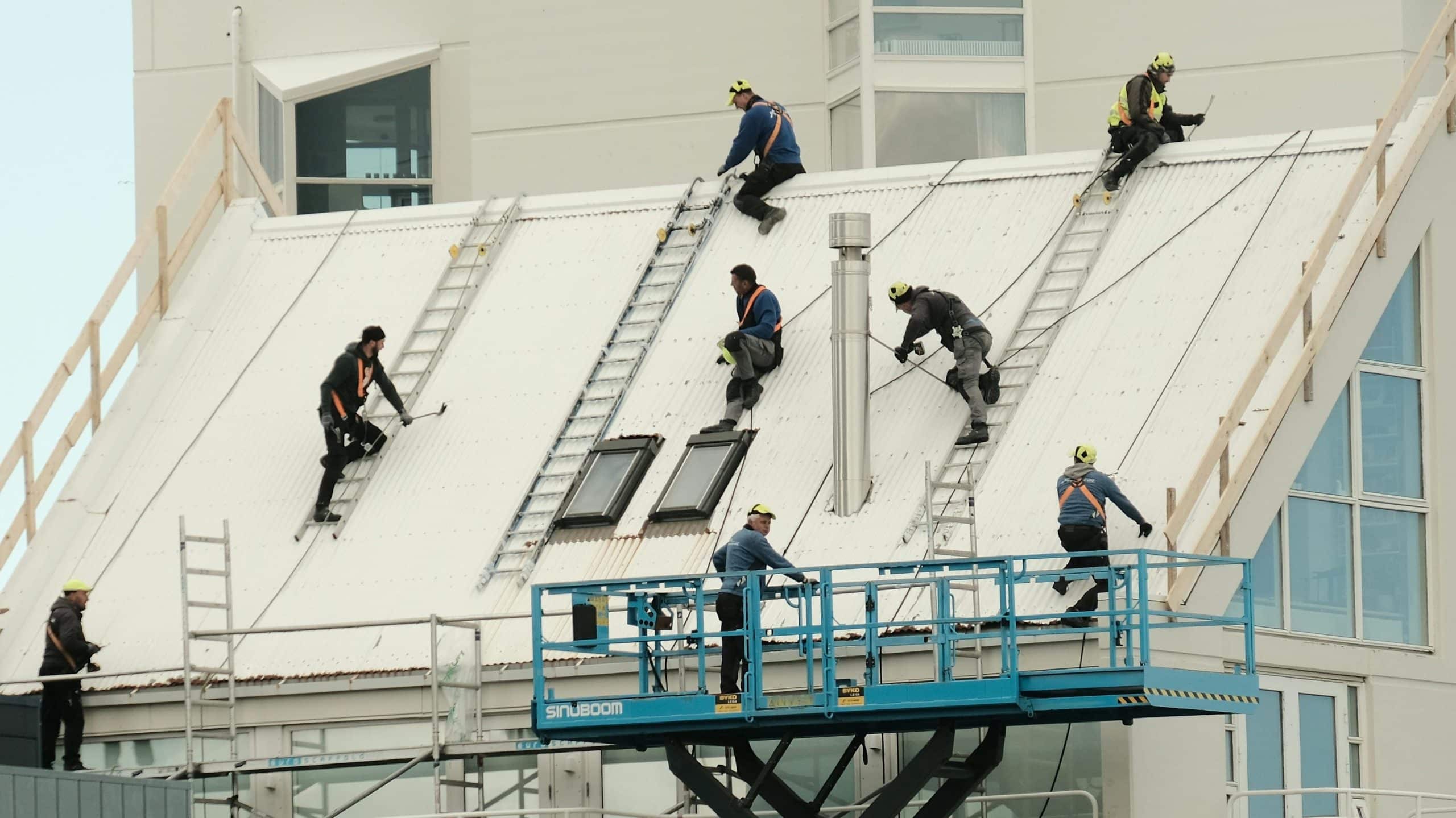 Construction workors working on a roof
