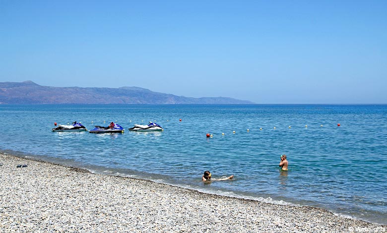 Children on the beach in holiday resort Gerani