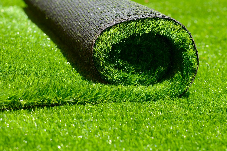 artificial rolled green grass; closeup