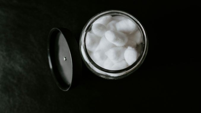 Making cosmetics sustainable with generative AI Container with cotton balls illustrating an AI partnership between L’Oréal and IBM to use foundation models to improve sustainability and innovation in the beauty and cosmetics industry.