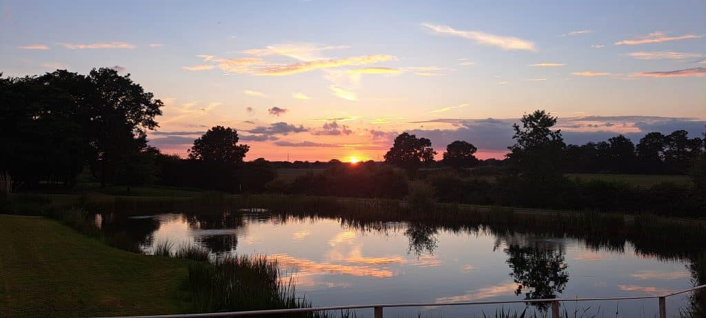 The lake at sunset at Alrewas Hayes Wedding Venue