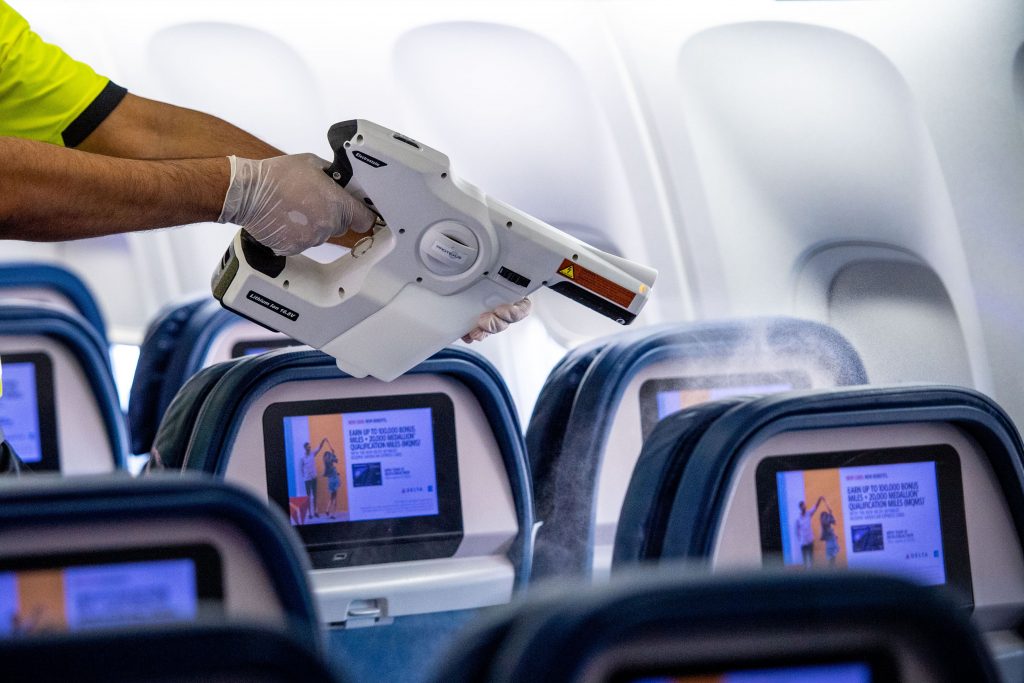 Delta airlines expand their cleaning processes to include a fogging procedure that disinfects surface areas that are often touched in the aircraft.