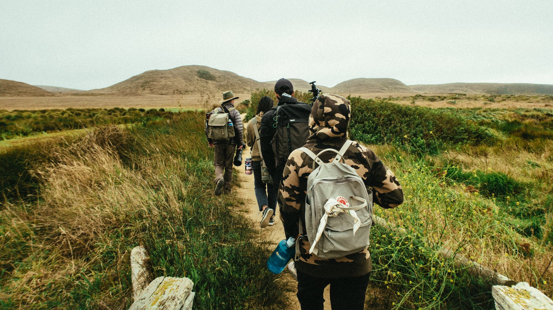 guys walking on trail