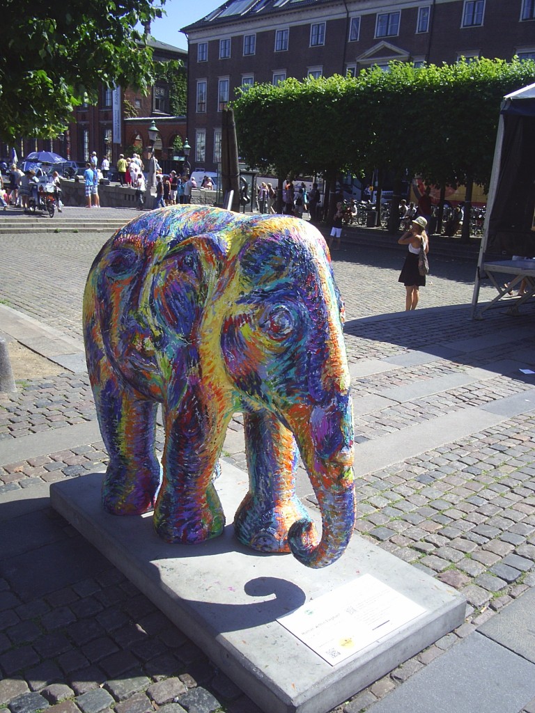 Elephant parade – asian elephants enjoy life in harbour and parks in ...